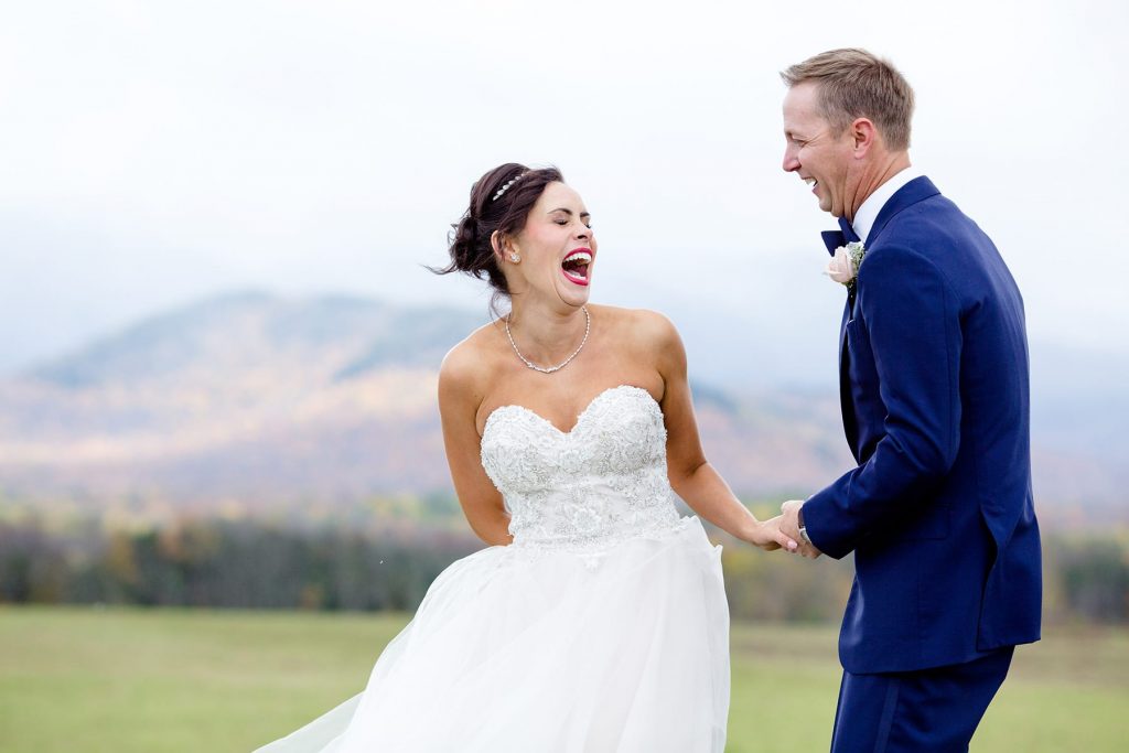 bride and groom laugh during their destination wedding portrait session