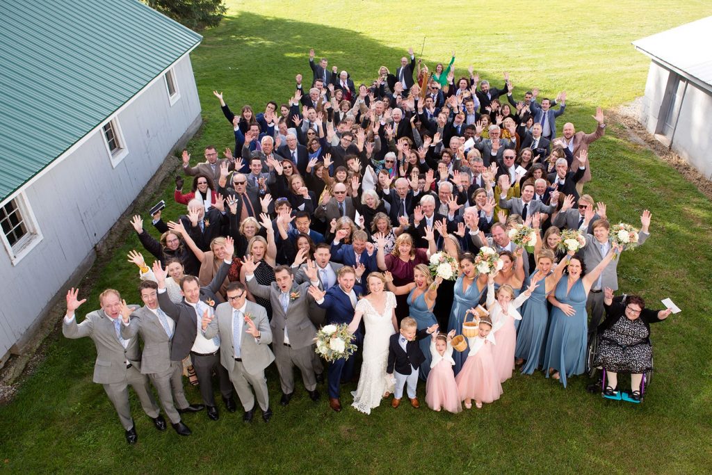 group picture of the all wedding guests from above
