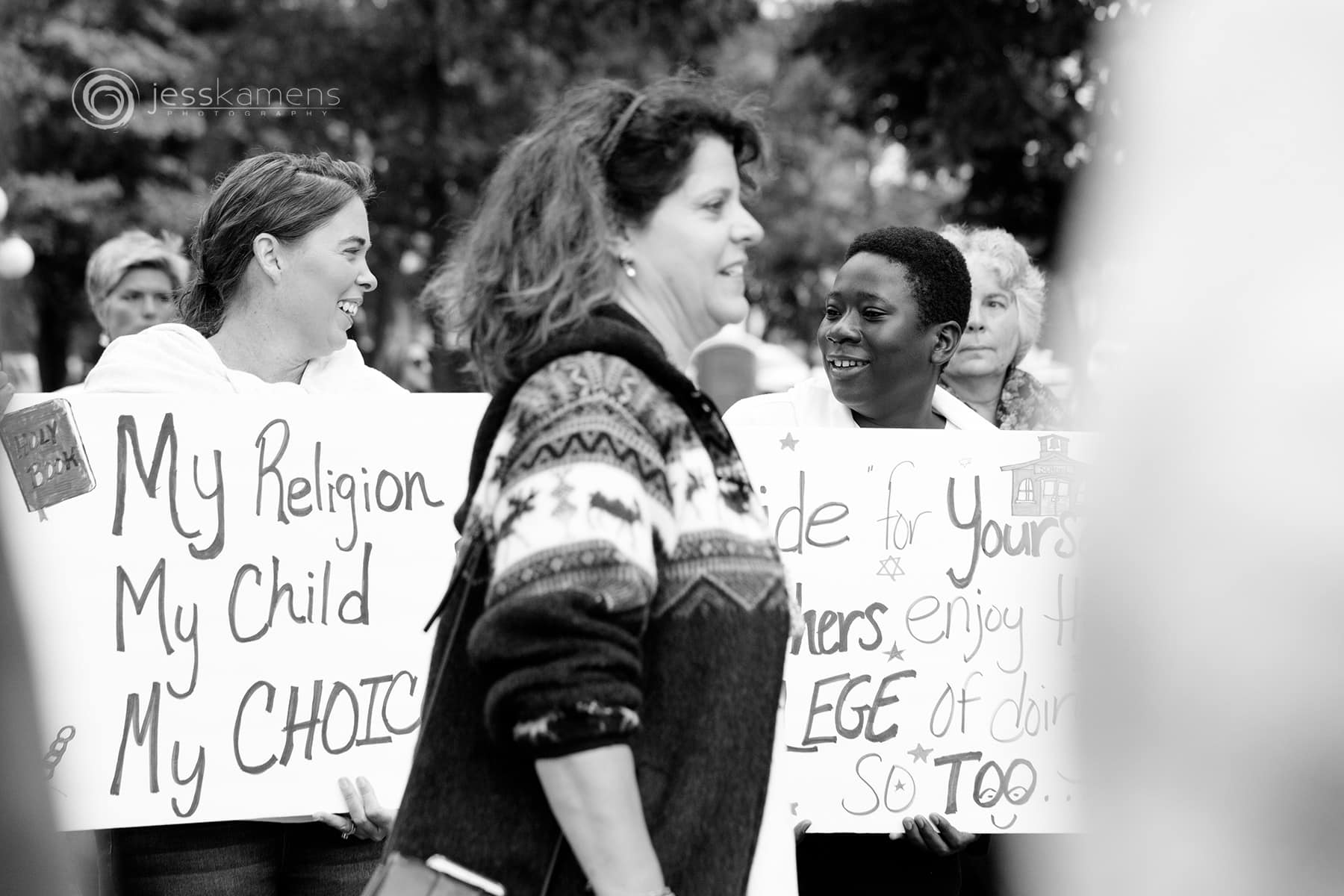 signs at a rally for religious freedom and the right to choose vaccinations in New York