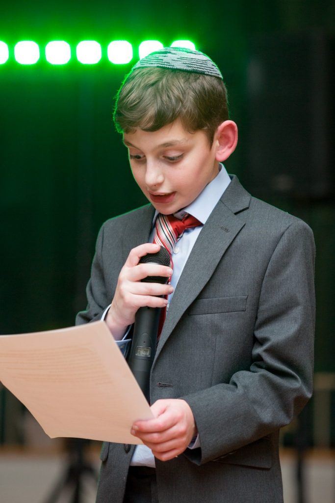 a jewish boy is giving his thankful speach
